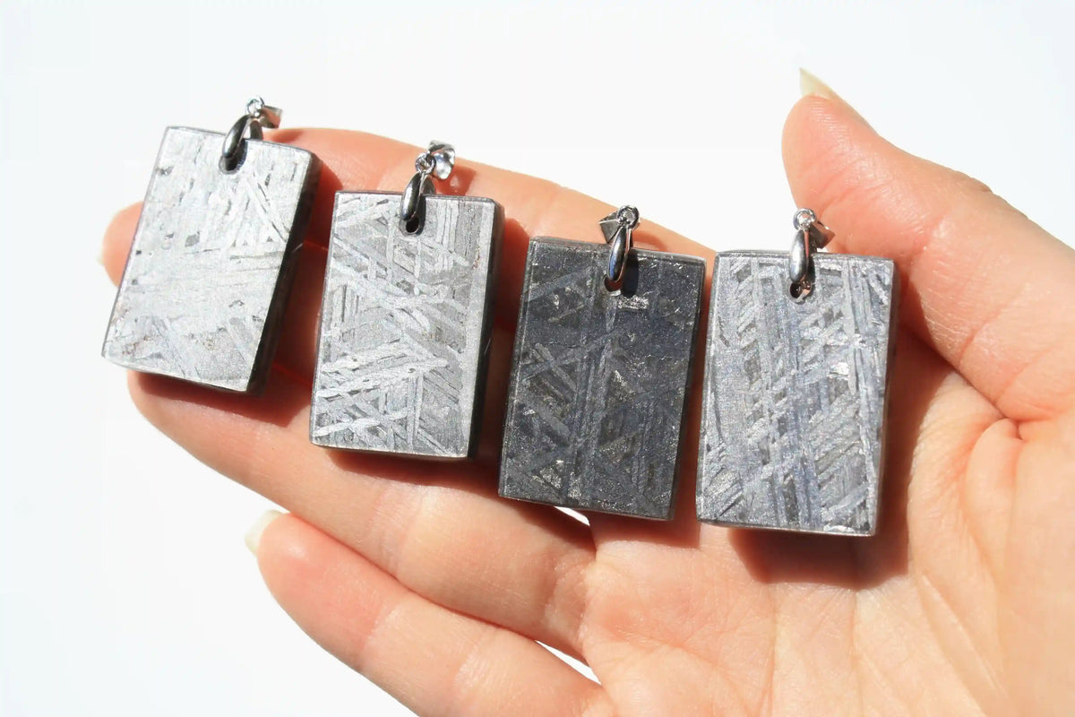 Aletai Meteorite pendants, aletai meteorite, crystal shop, meteorite on stand, crystals from space, moldavite, Widmanstätten Pattern, iron meteorite