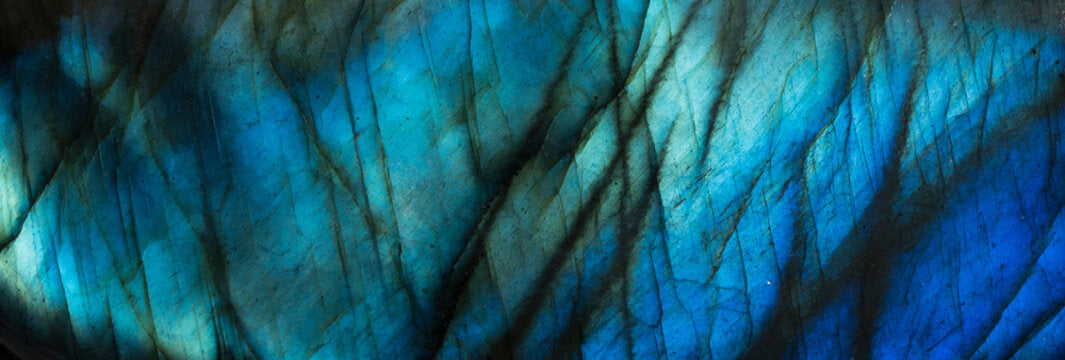 Labradorite crystal gemstone with iridescent flashes of blue and green, rare collectible feldspar mineral