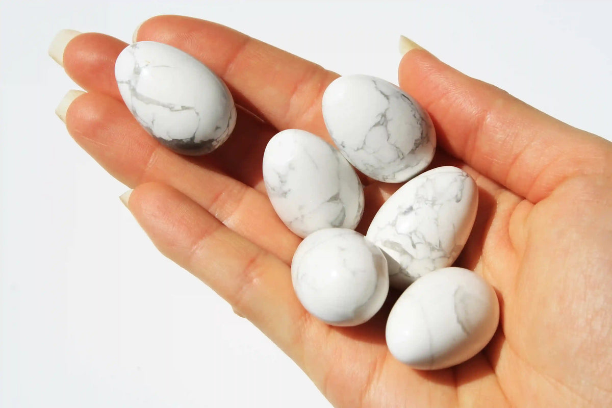 Howlite crystal egg-shaped stone with calming white tones and grey veining, symbolizing peace, clarity, and stress relief, howlite crystal, canadian crystal shop