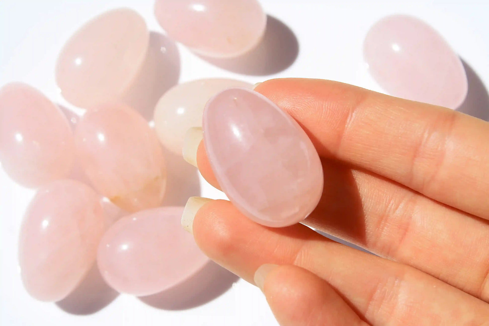 Rose quartz egg-shaped crystal symbolizing love, compassion, rose quartz, quartz crystal, Canadian crystal shop
