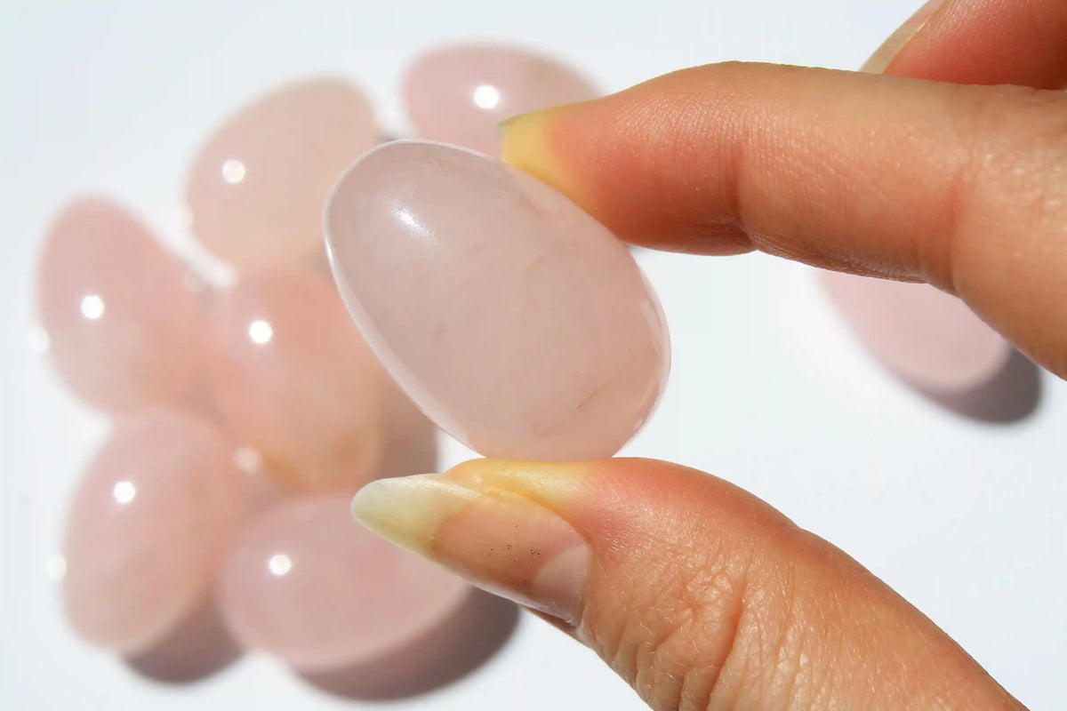 Rose quartz egg-shaped crystal symbolizing love, compassion, rose quartz, quartz crystal, Canadian crystal shop