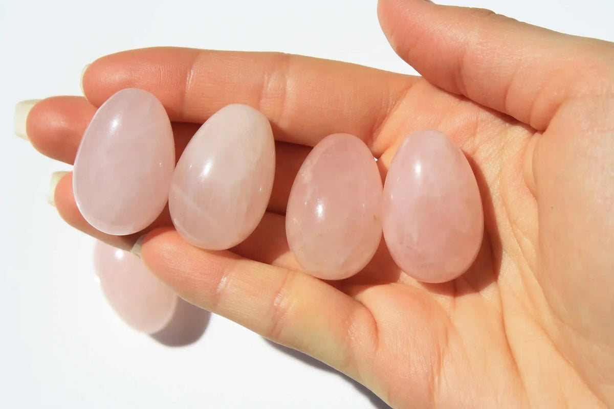 Rose quartz egg-shaped crystal symbolizing love, compassion, rose quartz, quartz crystal, Canadian crystal shop