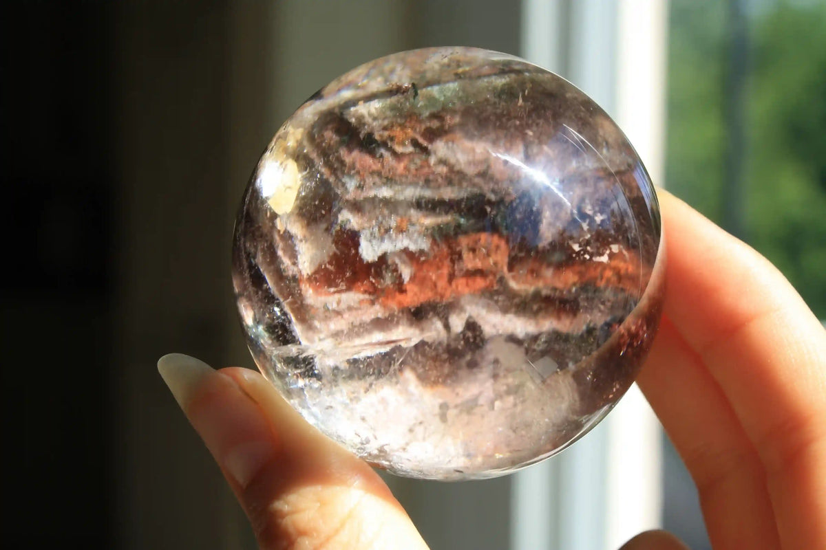 Garden quartz sphere with pink and red inclusions, rare lodolite quartz crystal specimen crystal sphere