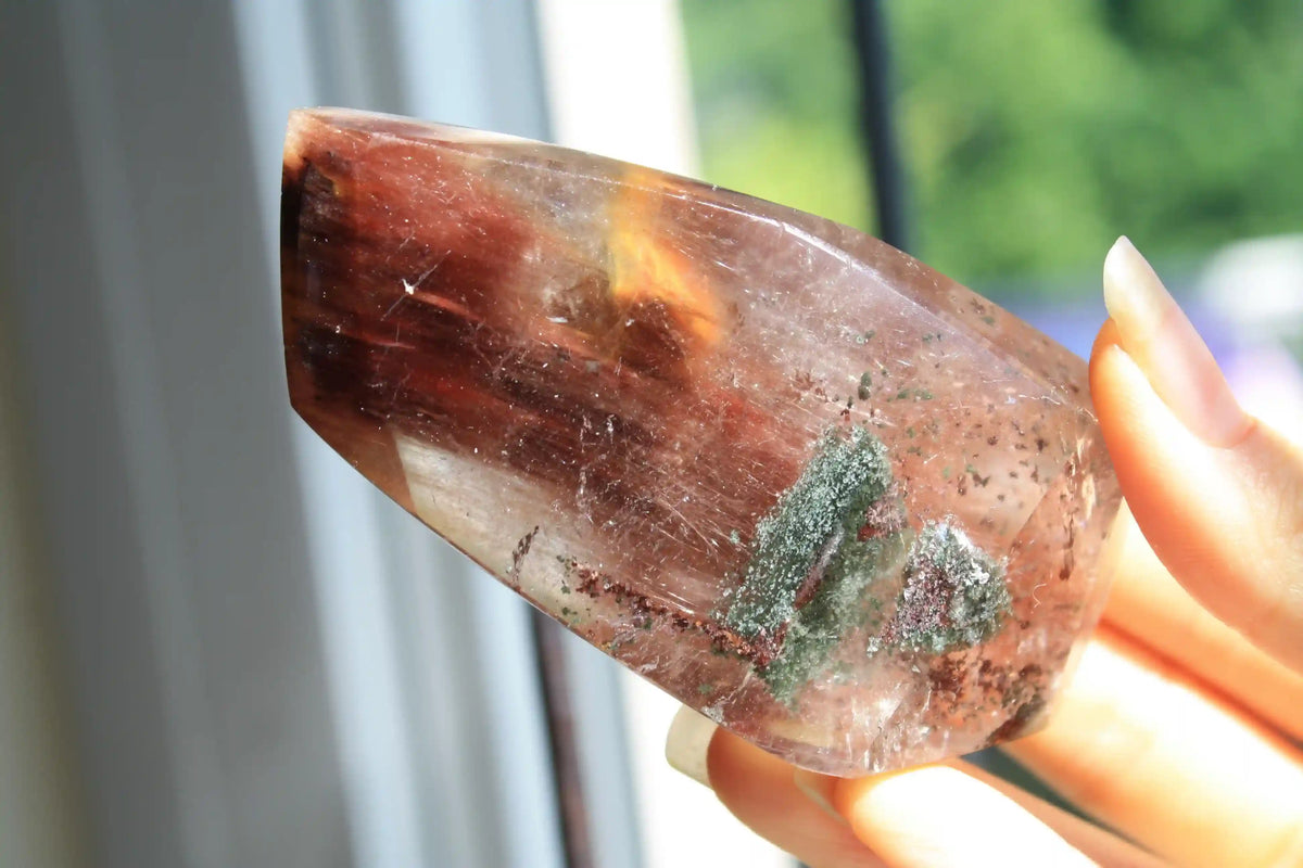 Amphibole quartz crystal , pink amphibole, red amphibole  Canadian crystal shop, amphibole tower, unique inclusion crystal