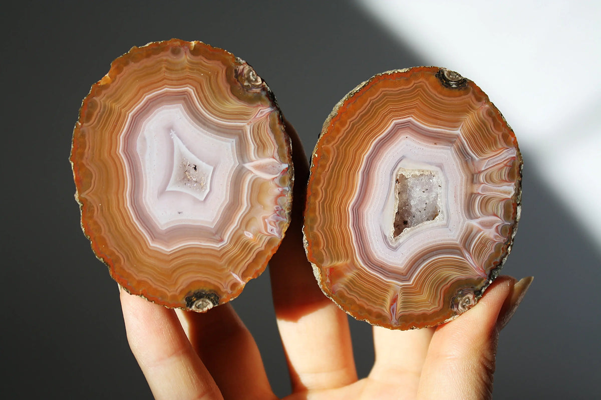 Vibrant Zhanguo agate with bold, swirling bands of crimson, gold, and jade, glowing with depth
