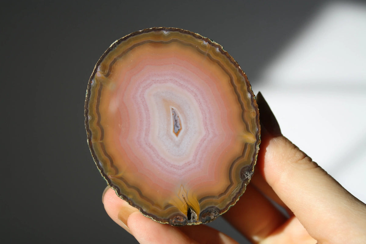Large banded pink Zhanguo agate pair with soft, flowing layers