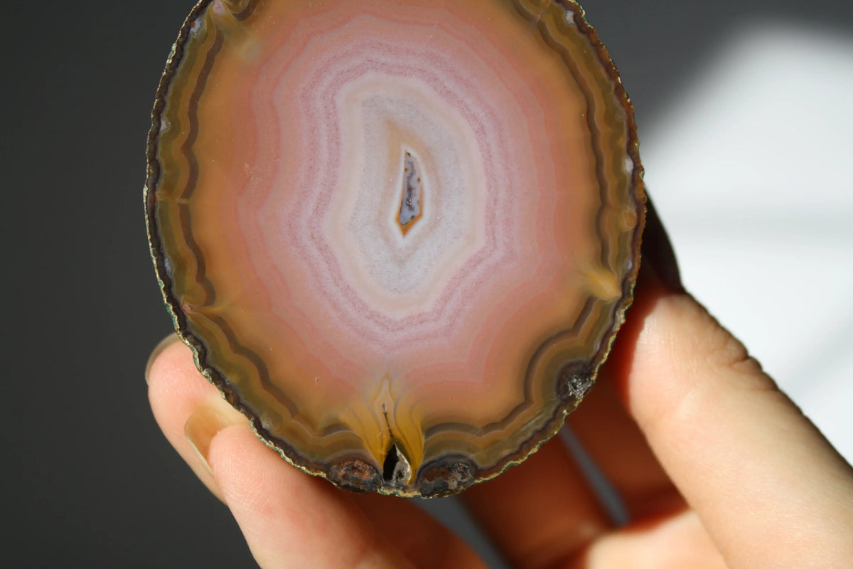 Large banded pink Zhanguo agate pair with soft, flowing layers