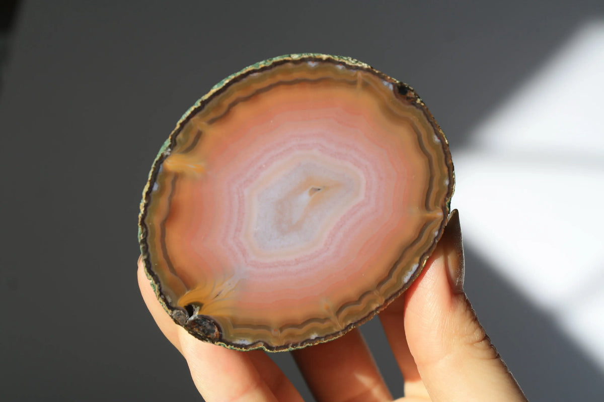 Large banded pink Zhanguo agate pair with soft, flowing layers