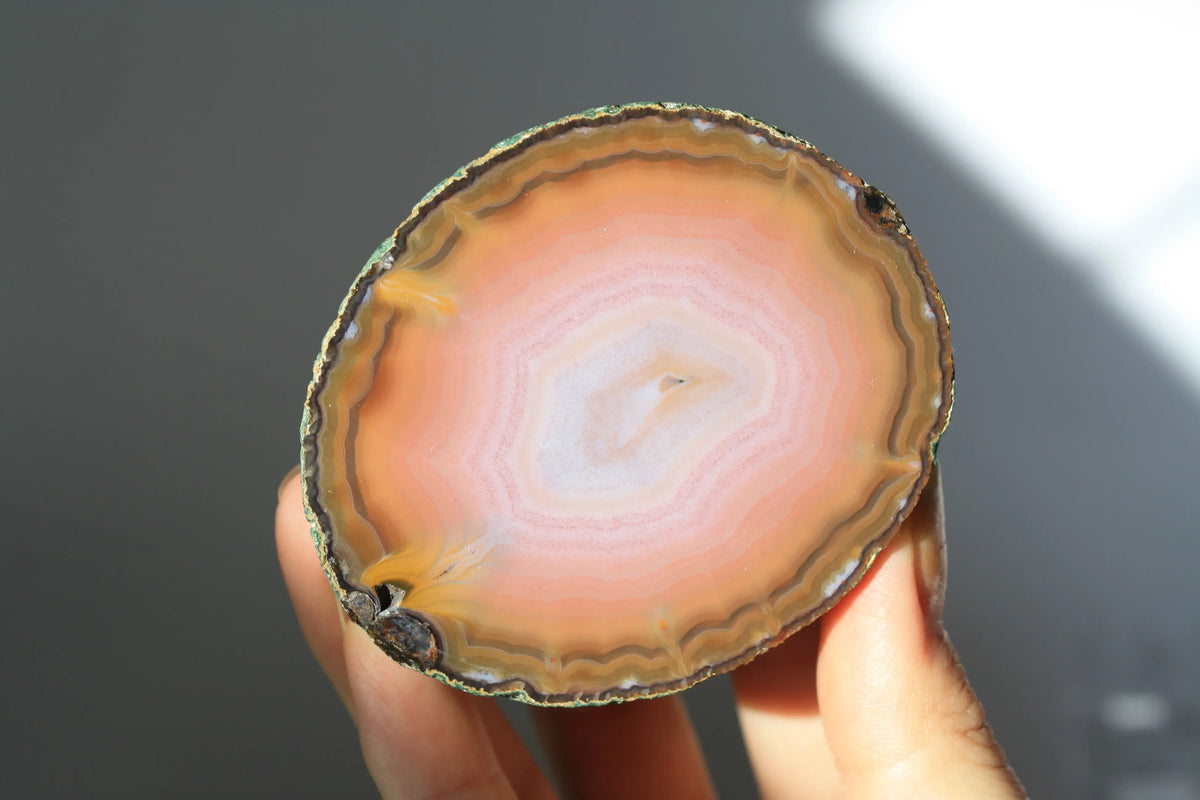 Large banded pink Zhanguo agate pair with soft, flowing layers