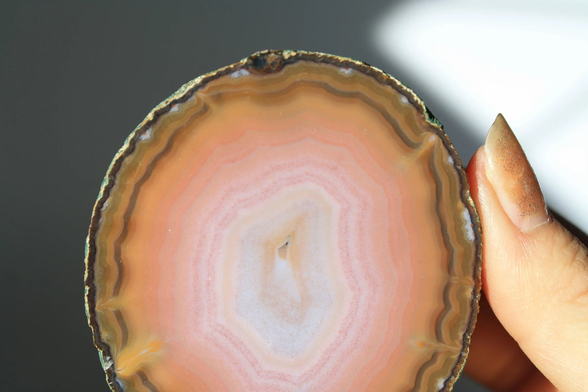 Large banded pink Zhanguo agate pair with soft, flowing layers