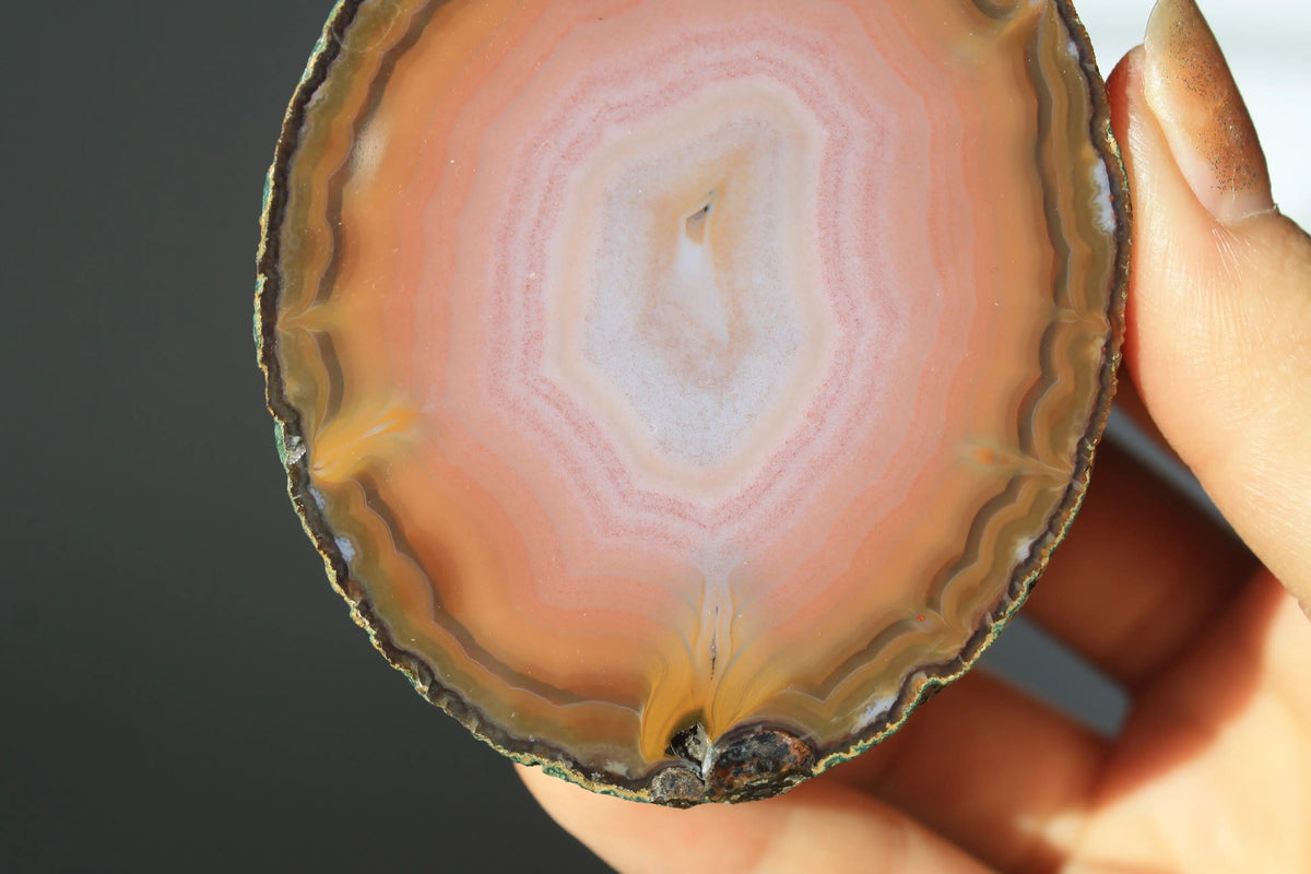 Large banded pink Zhanguo agate pair with soft, flowing layers