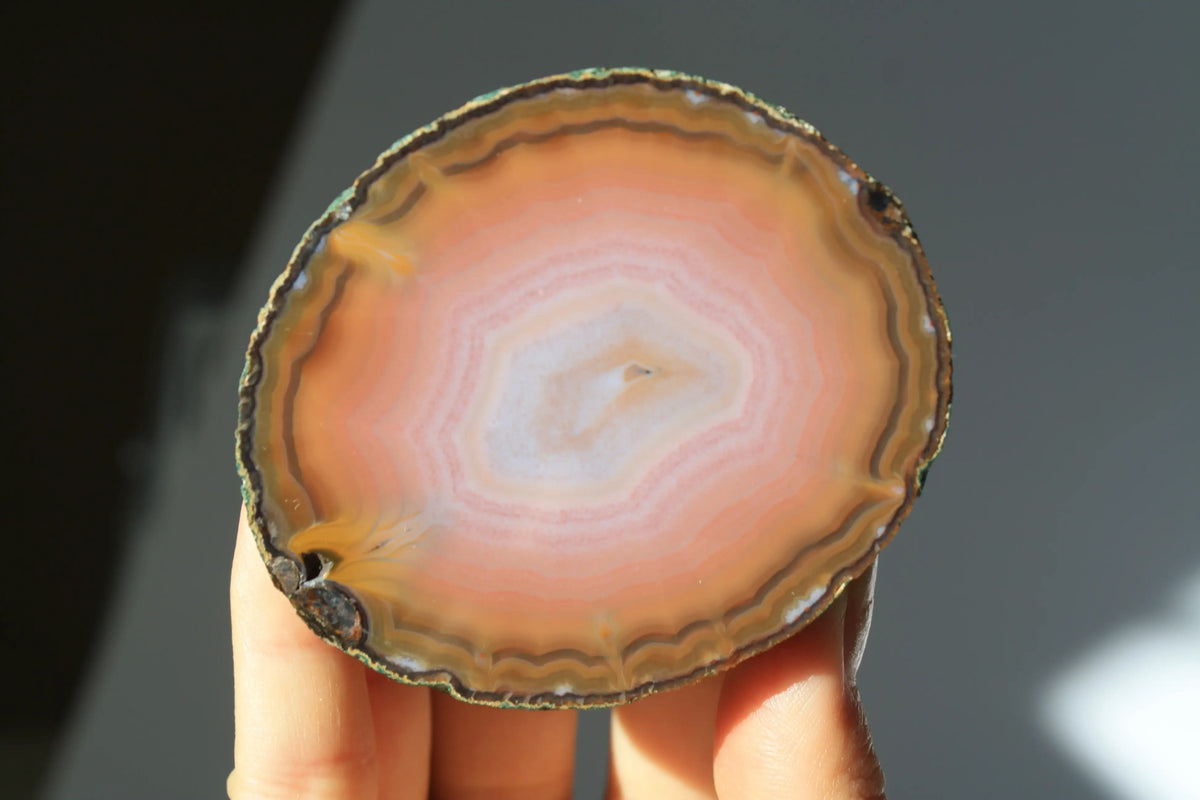Large banded pink Zhanguo agate pair with soft, flowing layers