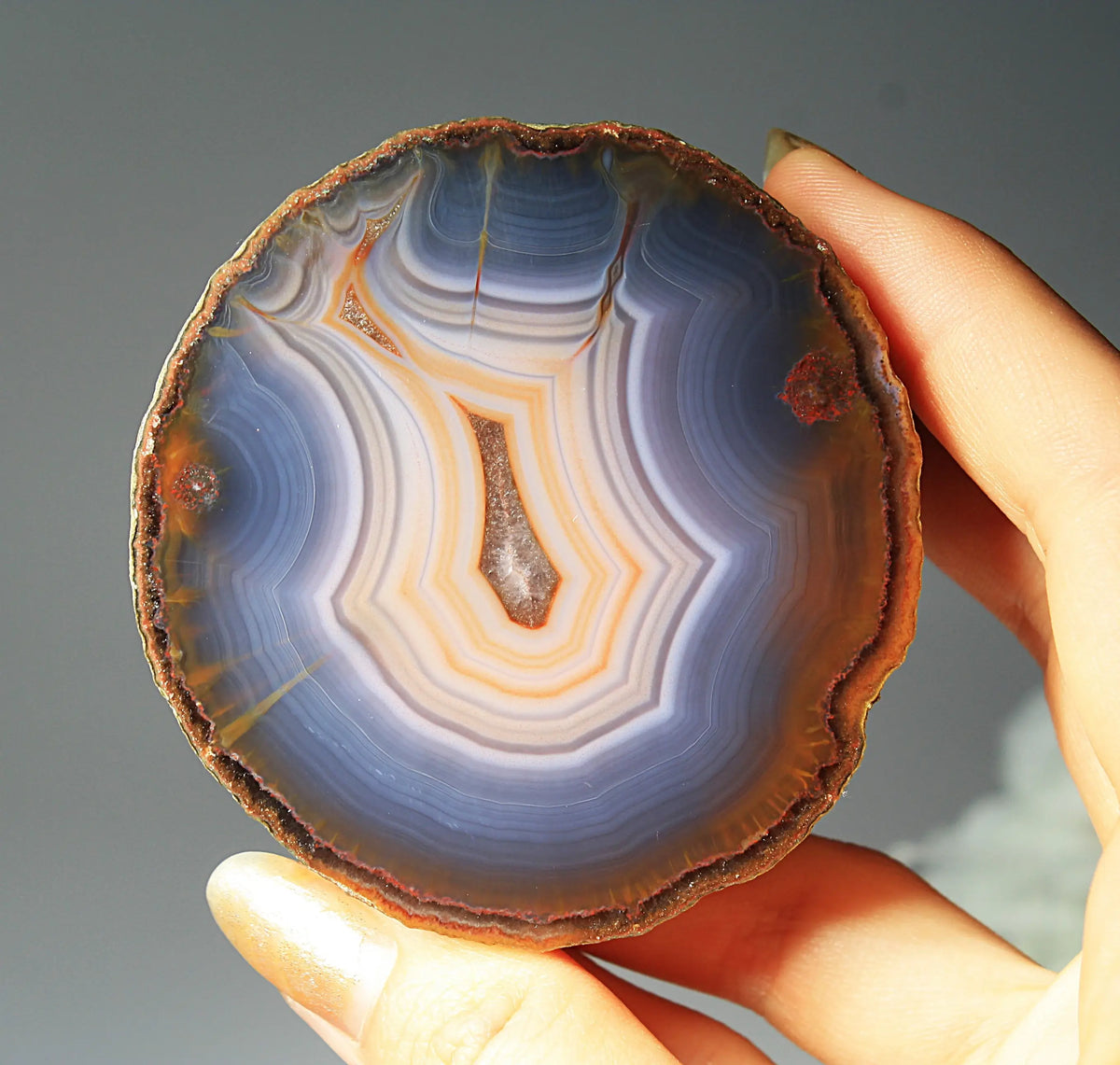Banded blue Zhanguo agate featuring natural layered patterns and a polished finish