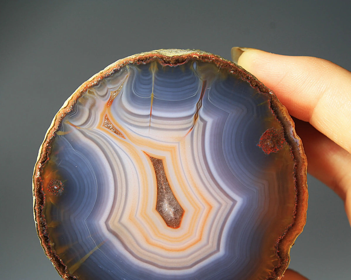 Banded blue Zhanguo agate featuring natural layered patterns and a polished finish