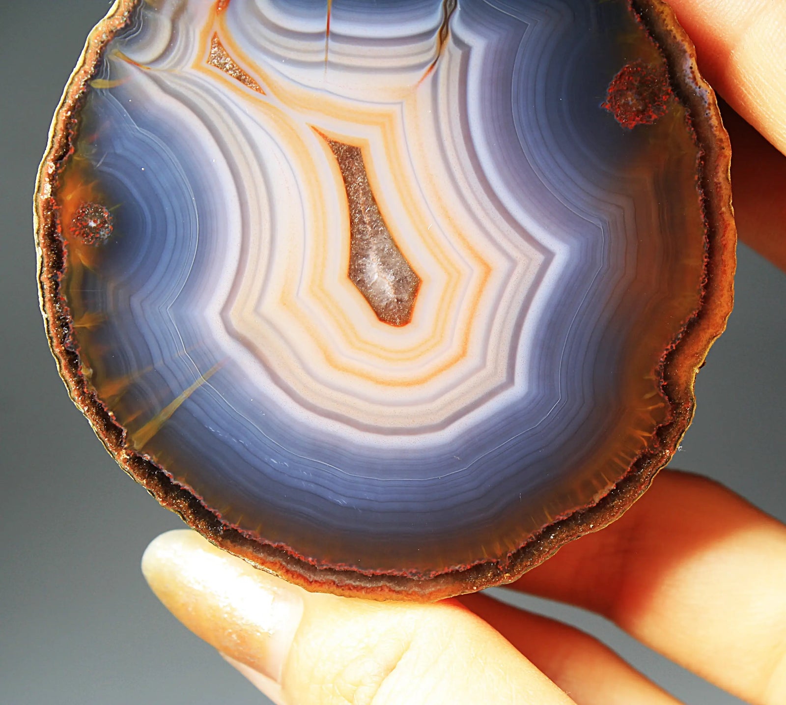 Banded blue Zhanguo agate featuring natural layered patterns and a polished finish