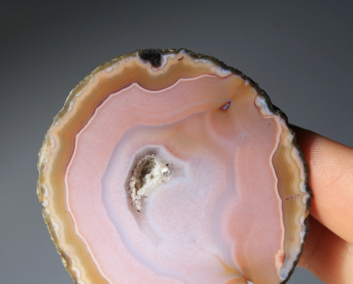 Pink Zhanguo agate pair with delicate, fluid banding