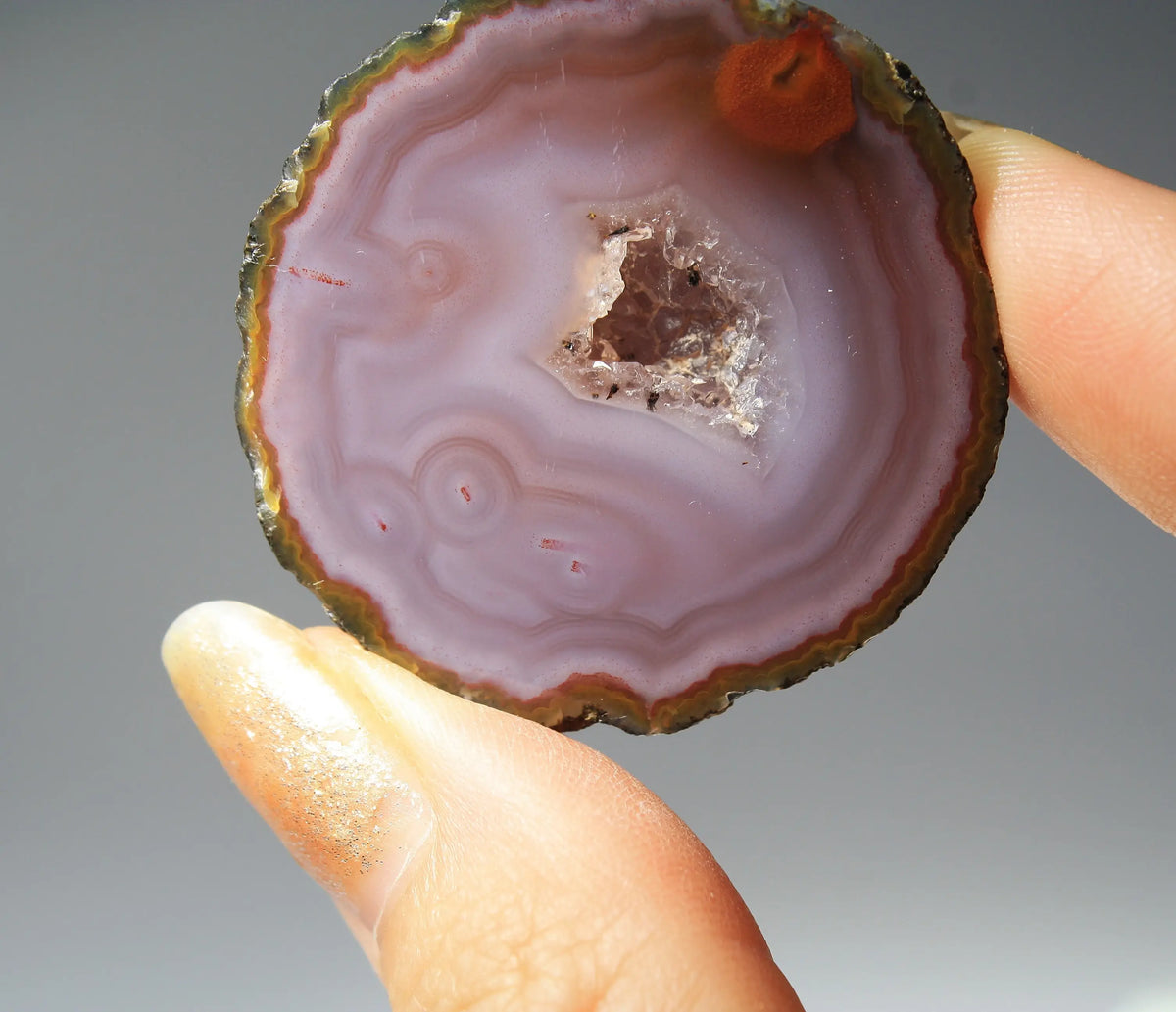 Banded purple Zhanguo agate pair with vivid swirling layers