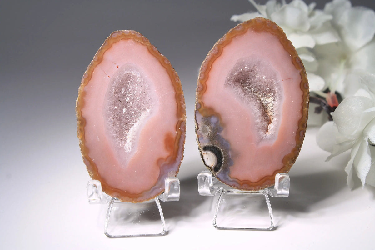 Vibrant pink Zhanguo agate pair with delicate layered patterns