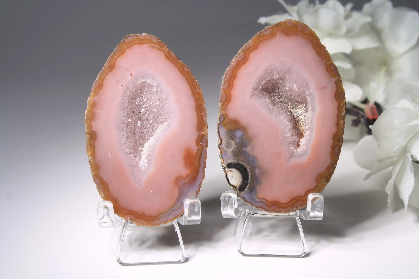 Vibrant pink Zhanguo agate pair with delicate layered patterns