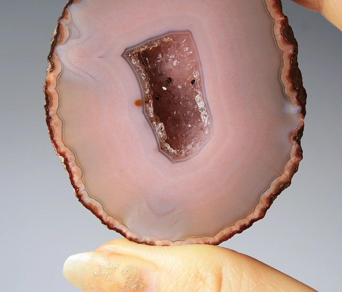Delicate pink Zhanguo agate pair with layered, gentle bands