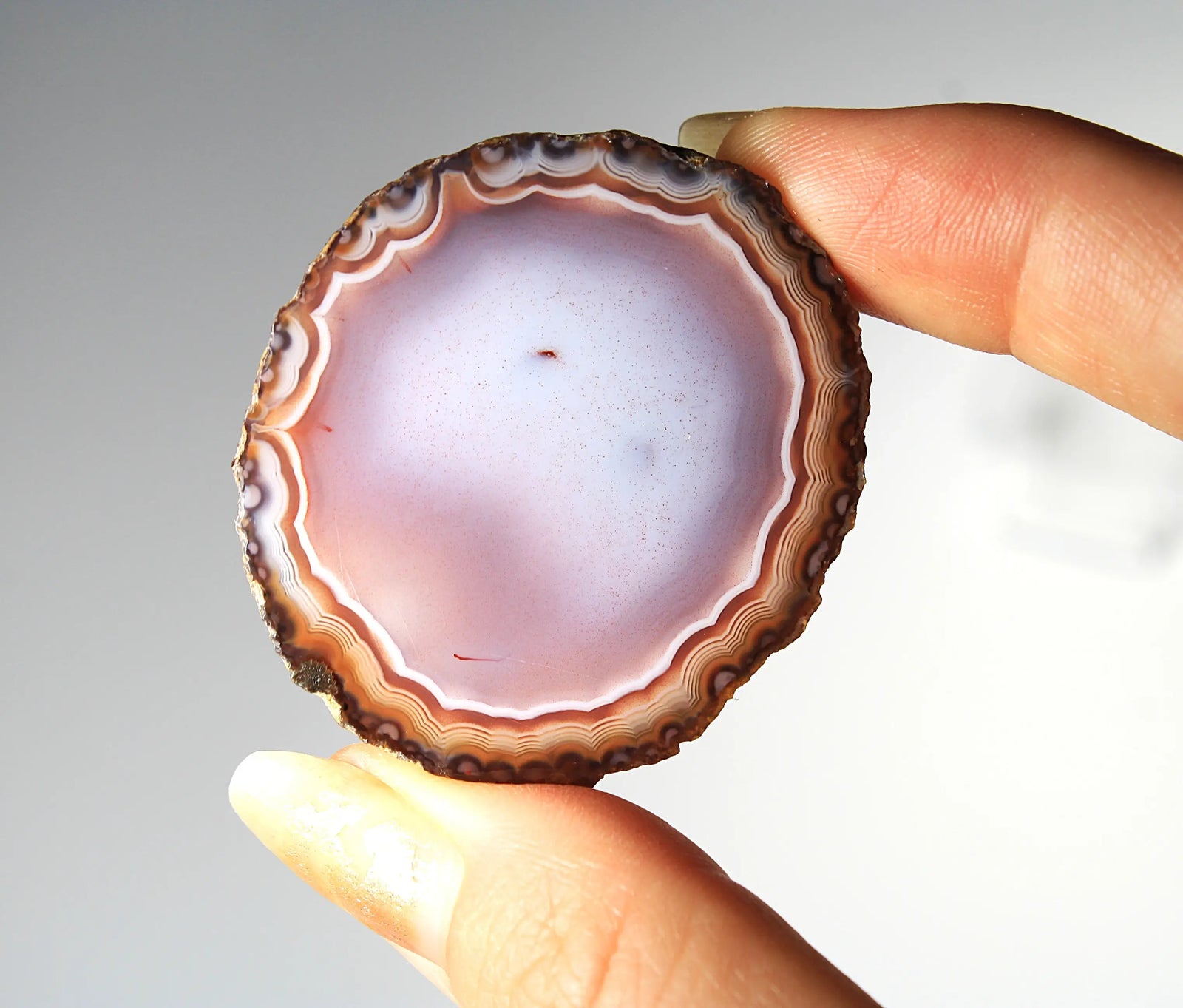 Banded deep purple Zhanguo agate pair with rich, swirling layers