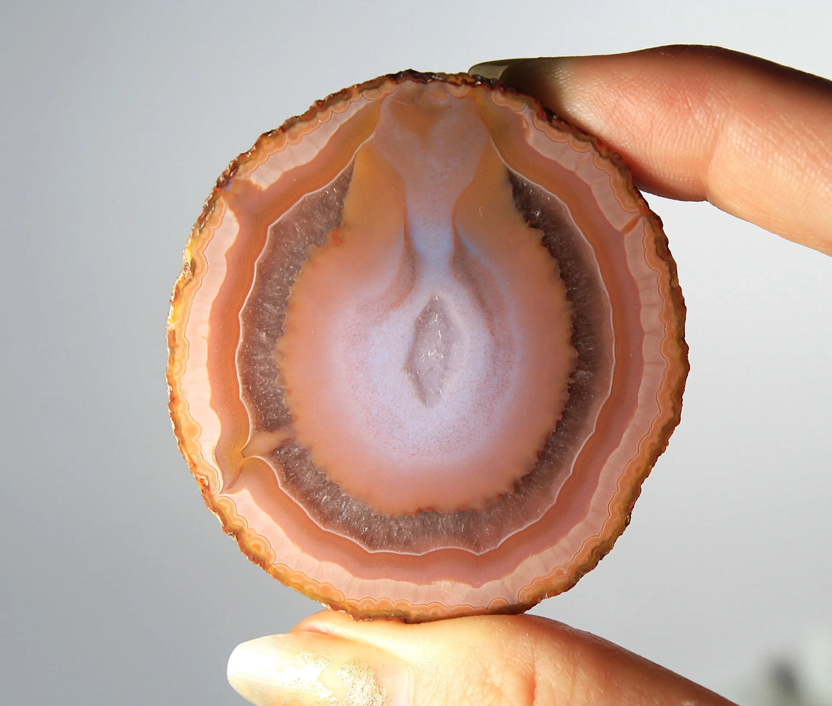 Bold and unique pink Zhanguo agate pair with rich, swirling textures