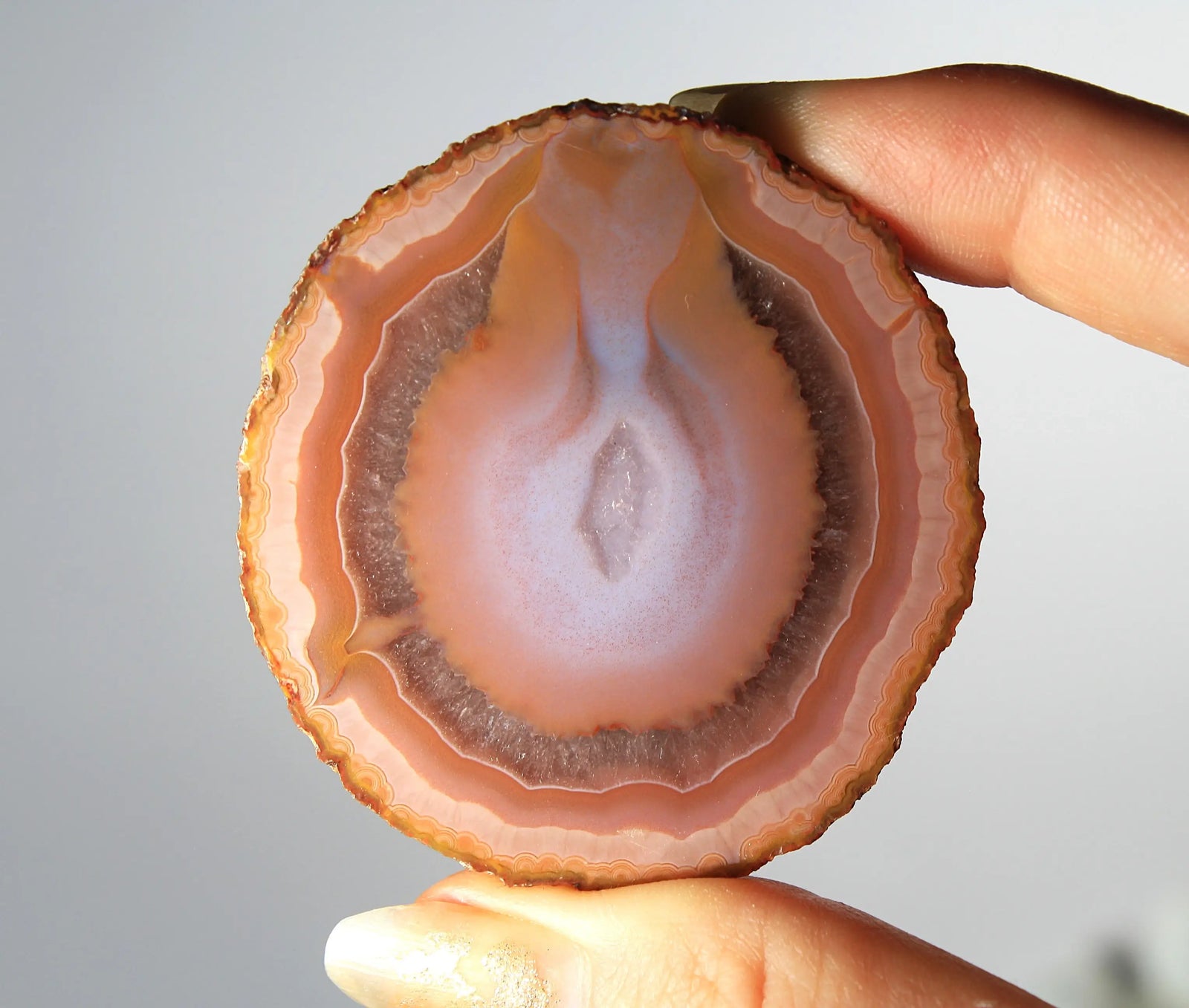 Bold and unique pink Zhanguo agate pair with rich, swirling textures