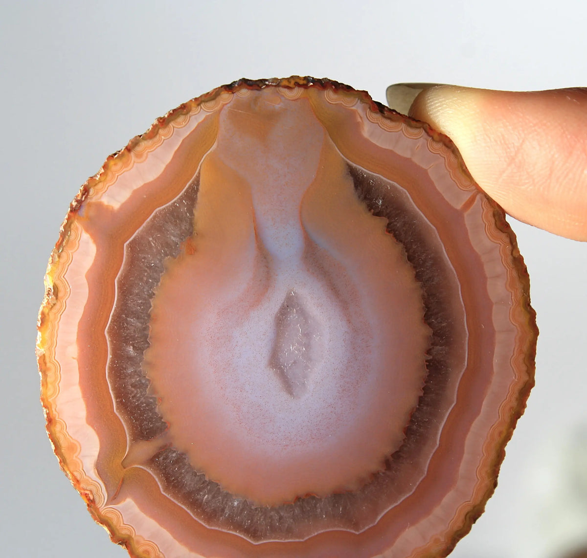 Bold and unique pink Zhanguo agate pair with rich, swirling textures