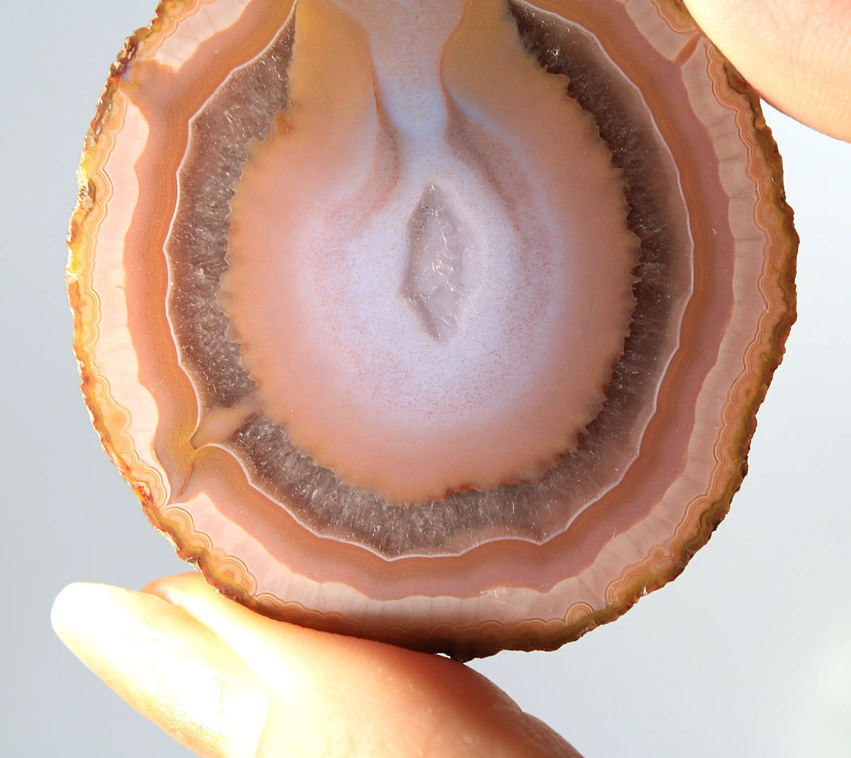 Bold and unique pink Zhanguo agate pair with rich, swirling textures
