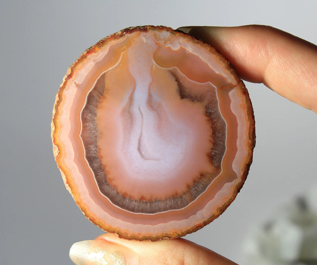 Bold and unique pink Zhanguo agate pair with rich, swirling textures
