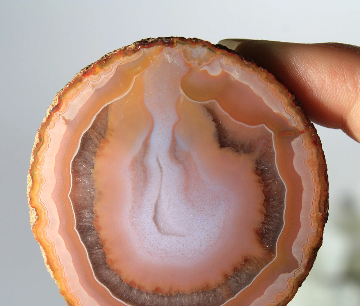 Bold and unique pink Zhanguo agate pair with rich, swirling textures