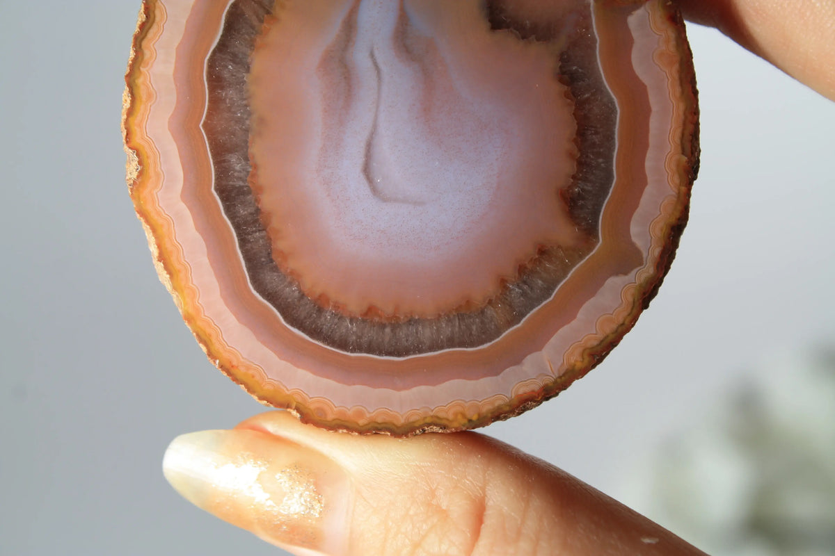 Bold and unique pink Zhanguo agate pair with rich, swirling textures