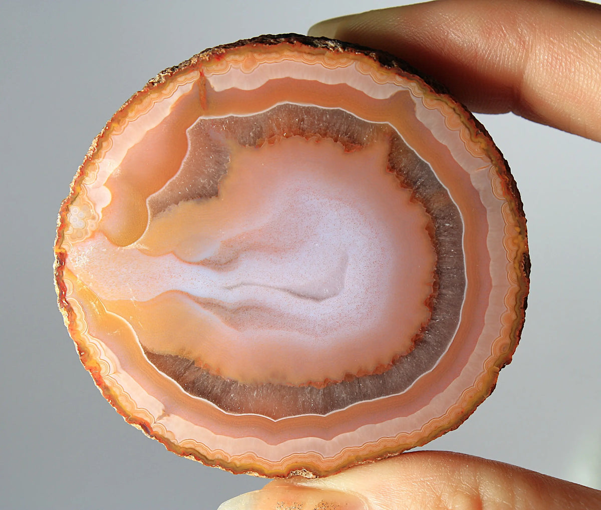 Bold and unique pink Zhanguo agate pair with rich, swirling textures