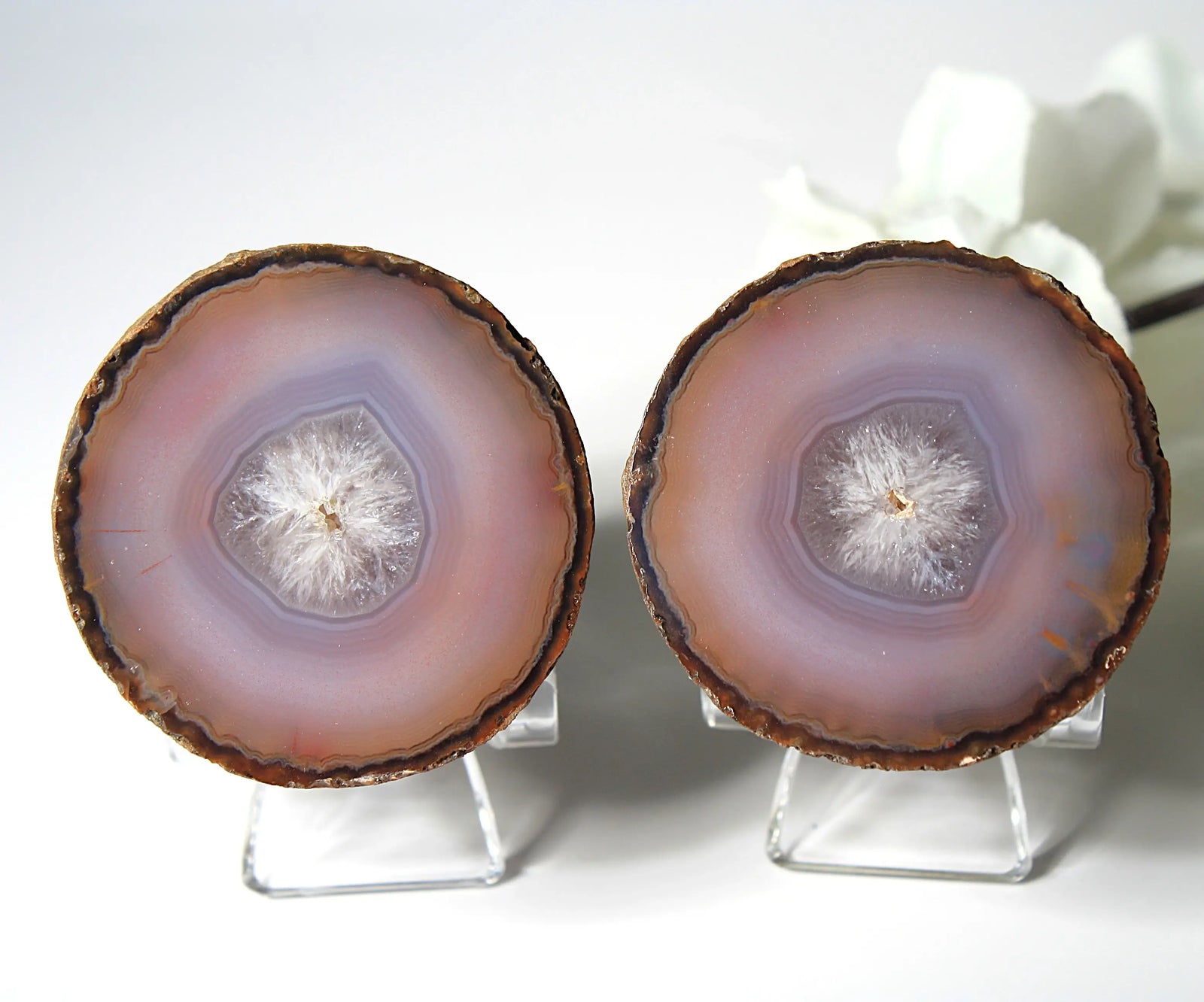Mystical purple Zhanguo agate pair with layered, luminous patterns
