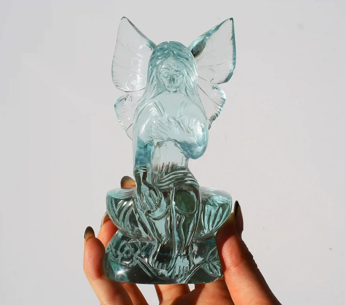 Light Blue Crystal Fairy Obsidian Carving by Vikas Meena