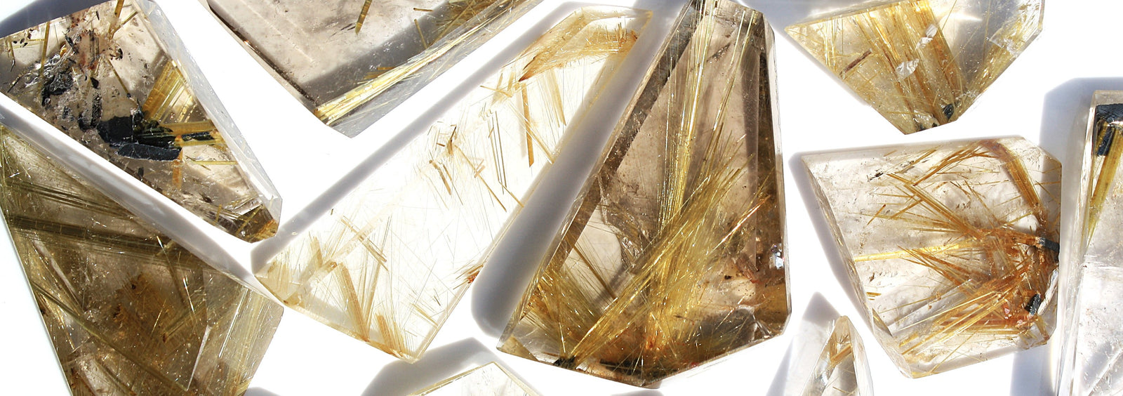 Rutile Quartz gemstone, quartz crystal with golden rutile inclusions and unique natural formations
