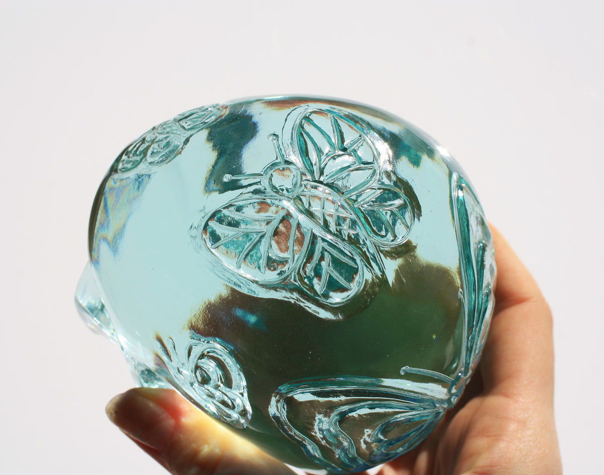 Blue obsidian crystal skull with hand engraved butterfly designs