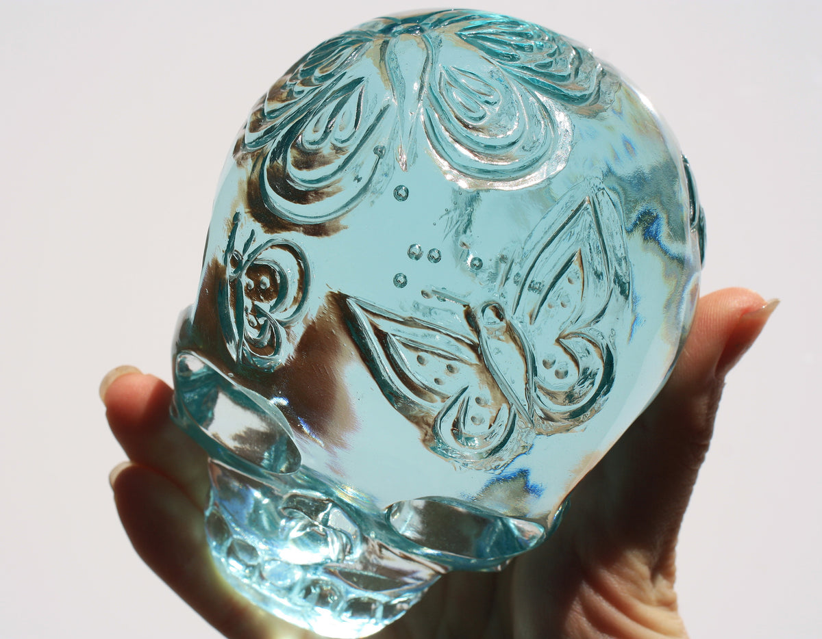 Obsidian Crystal Butterfly Engraved Skull by Vikas Meena