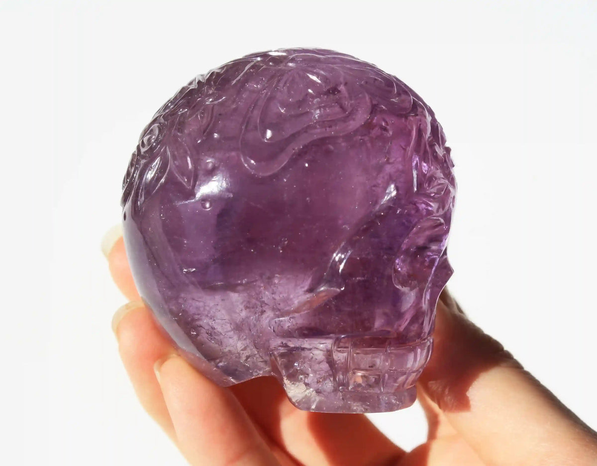 Amethyst Crystal Butterfly Engraved Skull by Vikas Meena