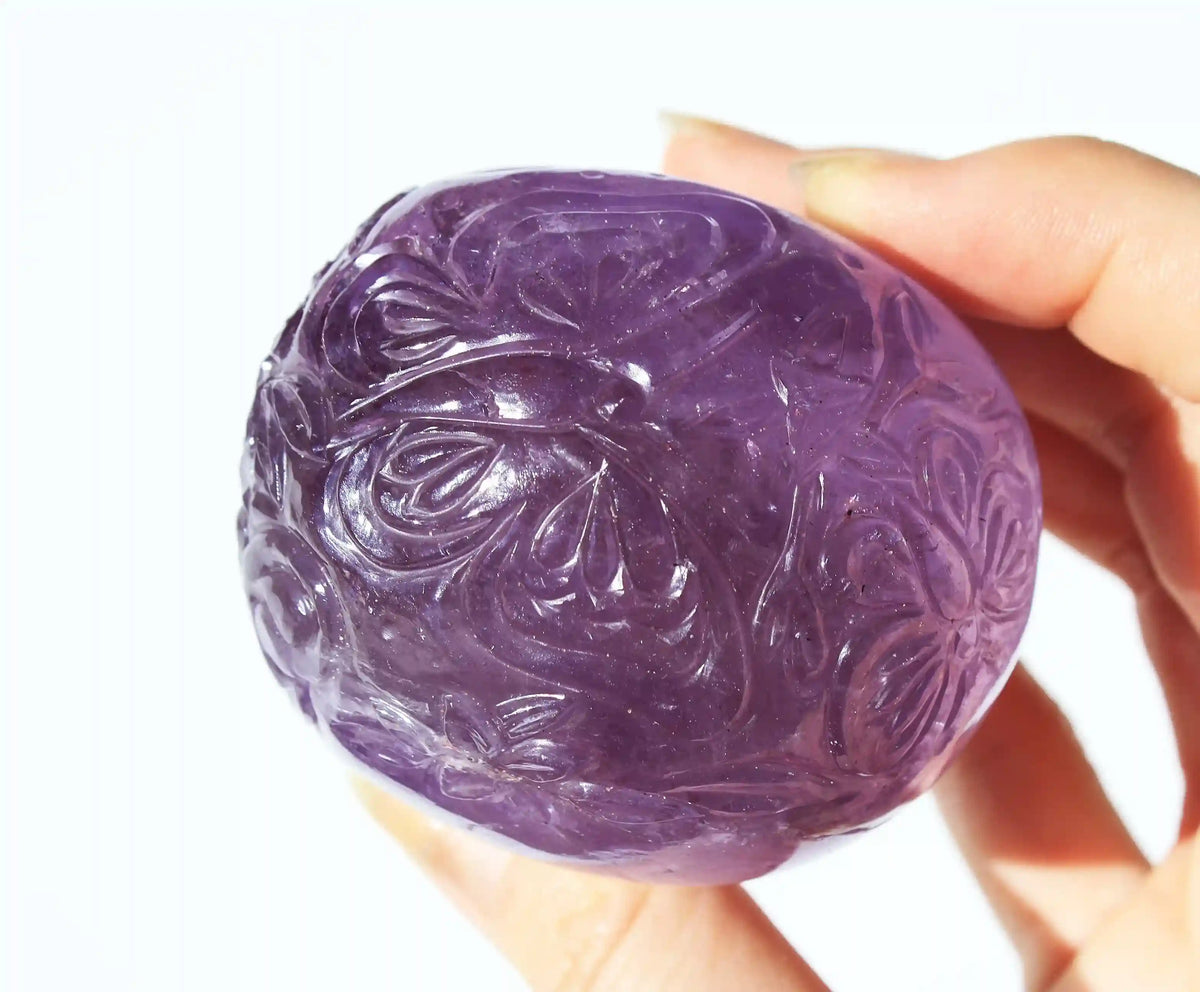 Amethyst Crystal Butterfly Engraved Skull by Vikas Meena