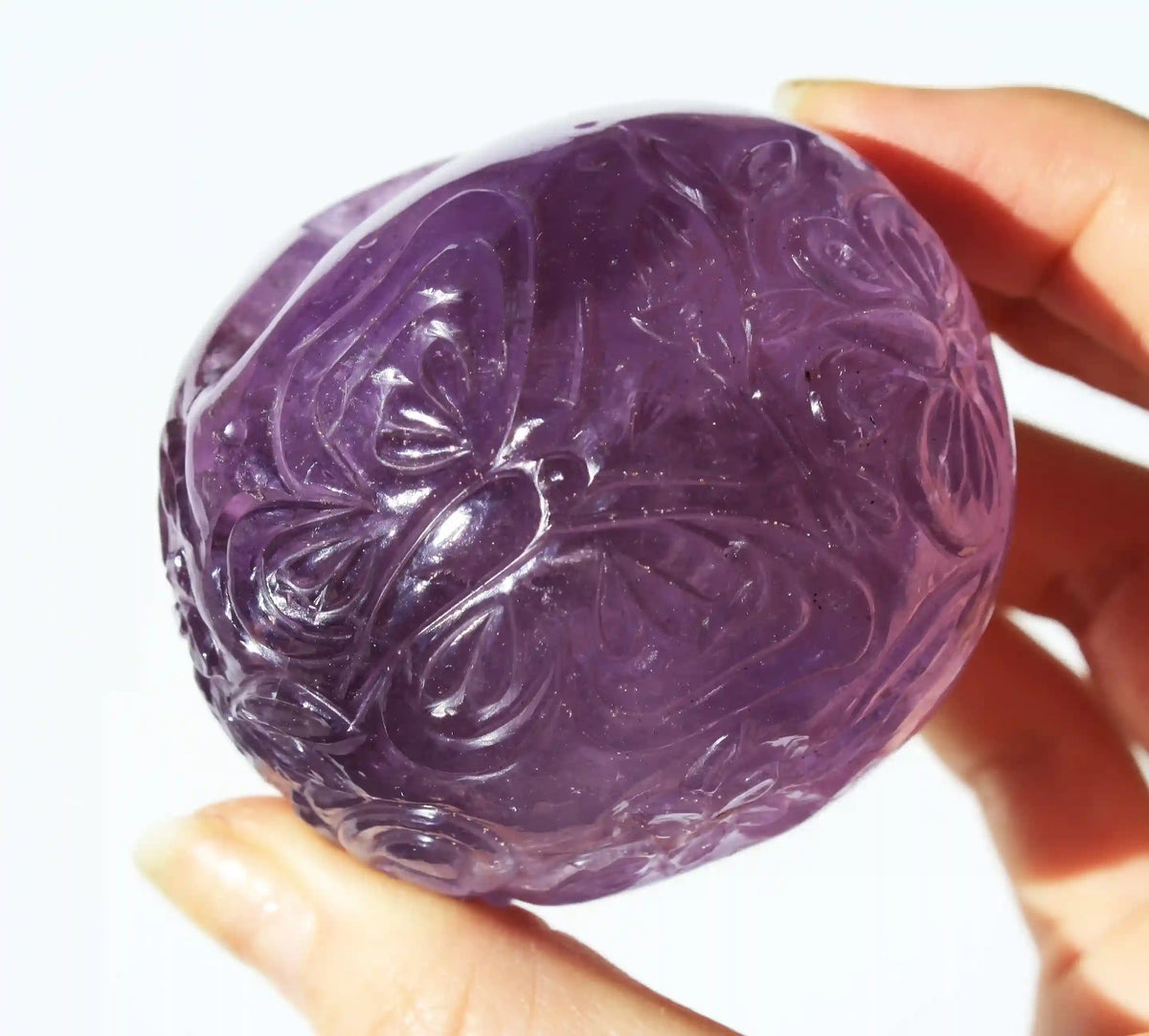 Amethyst Crystal Butterfly Engraved Skull by Vikas Meena