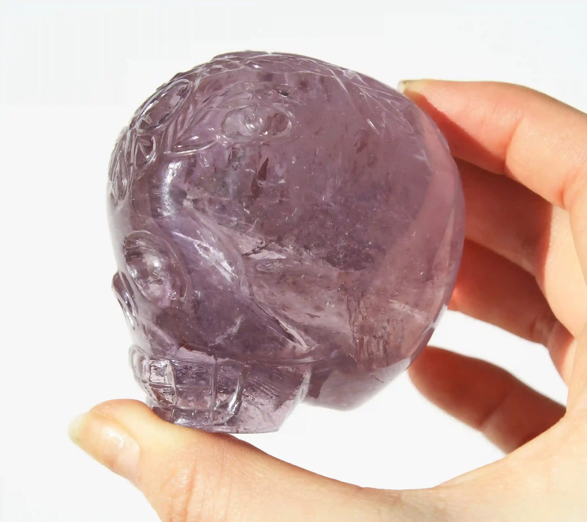 carved butterfly engraved amethyst crystal skull by vikas meena