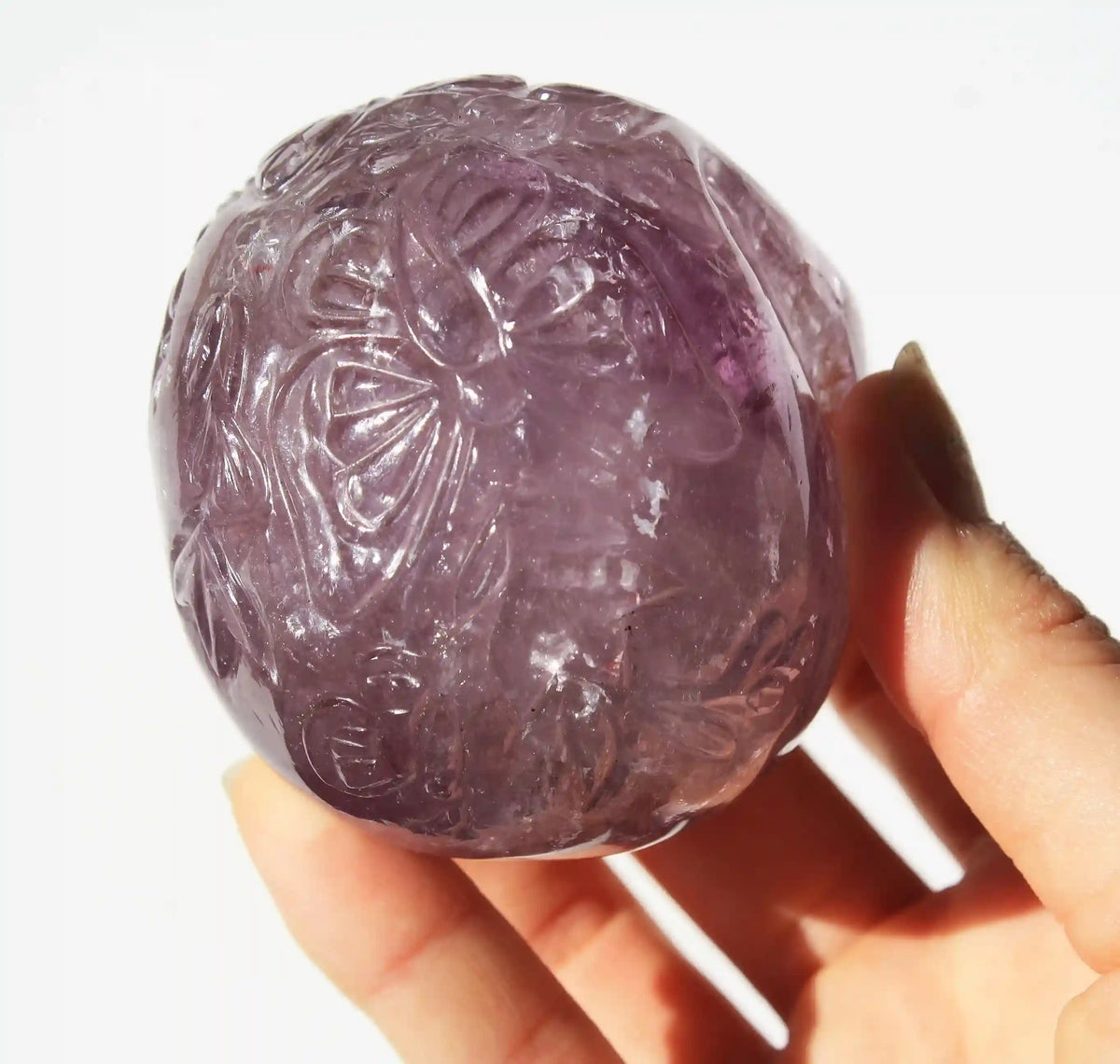 carved butterfly engraved amethyst crystal skull by vikas meena