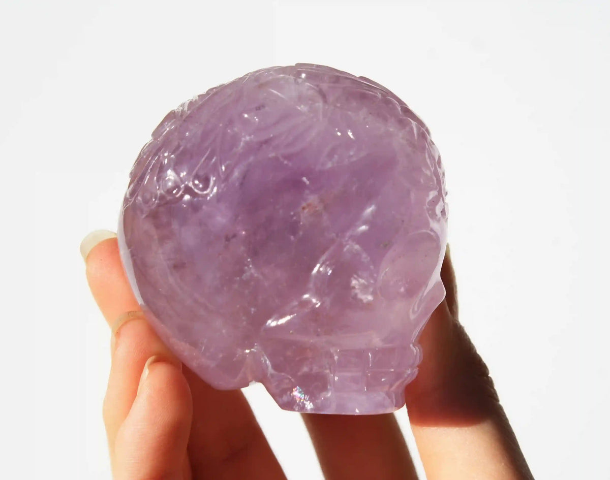 Amethyst Crystal Butterfly Engraved Skull by Vikas Meena