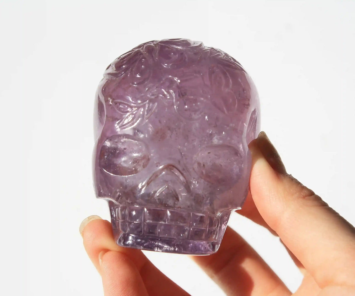 carved butterfly engraved amethyst crystal skull by vikas meena