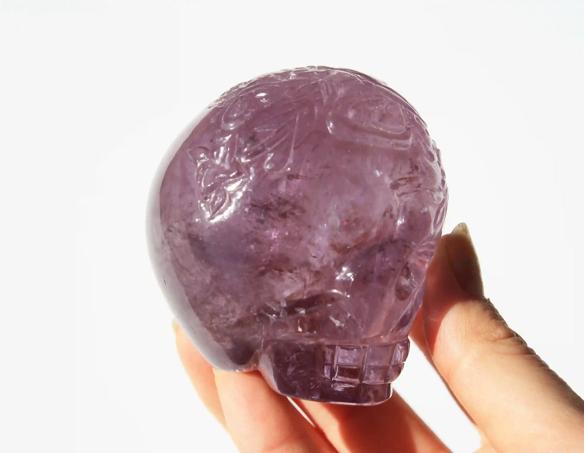 Amethyst Crystal Butterfly Engraved Skull by Vikas Meena