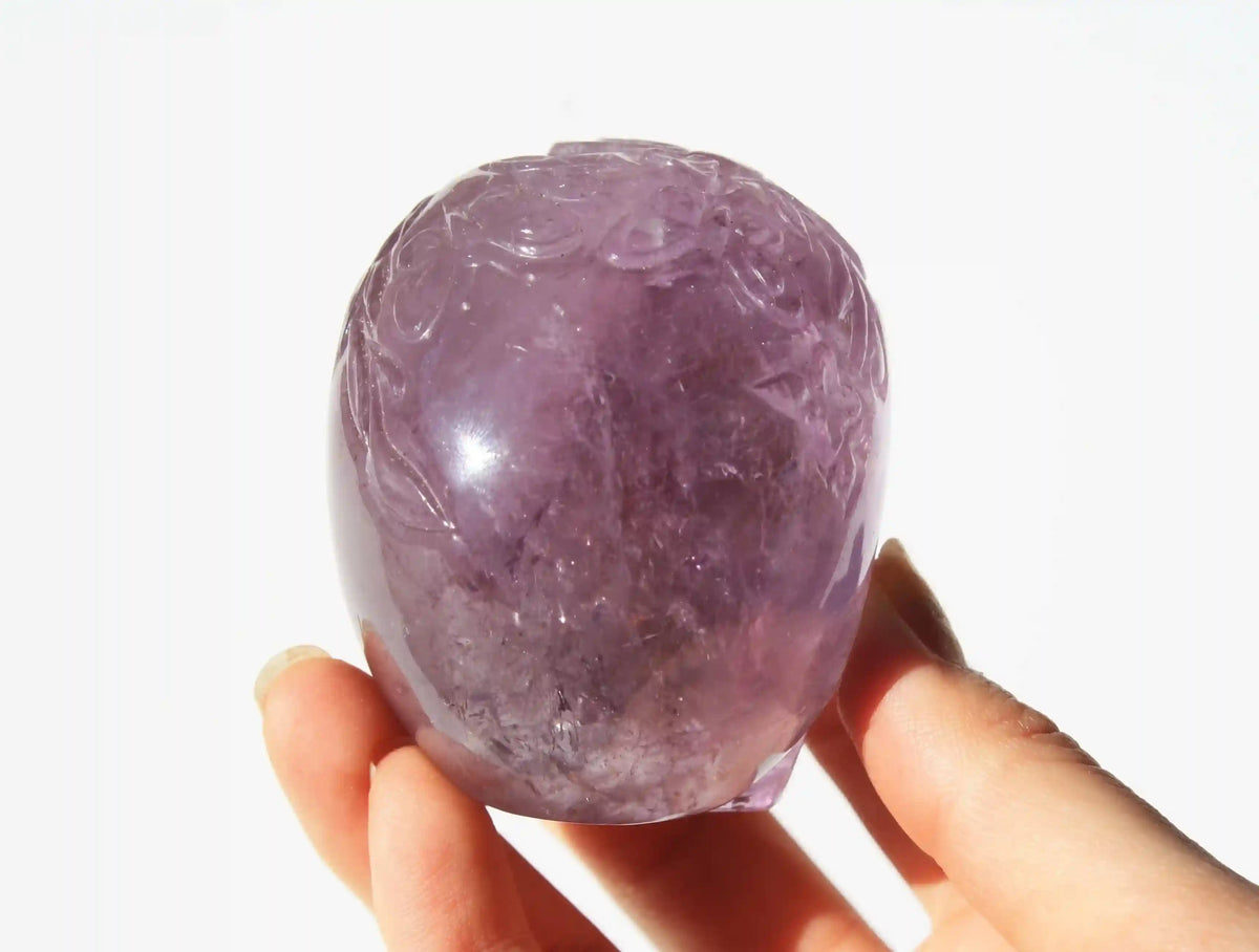 Amethyst Crystal Butterfly Engraved Skull by Vikas Meena