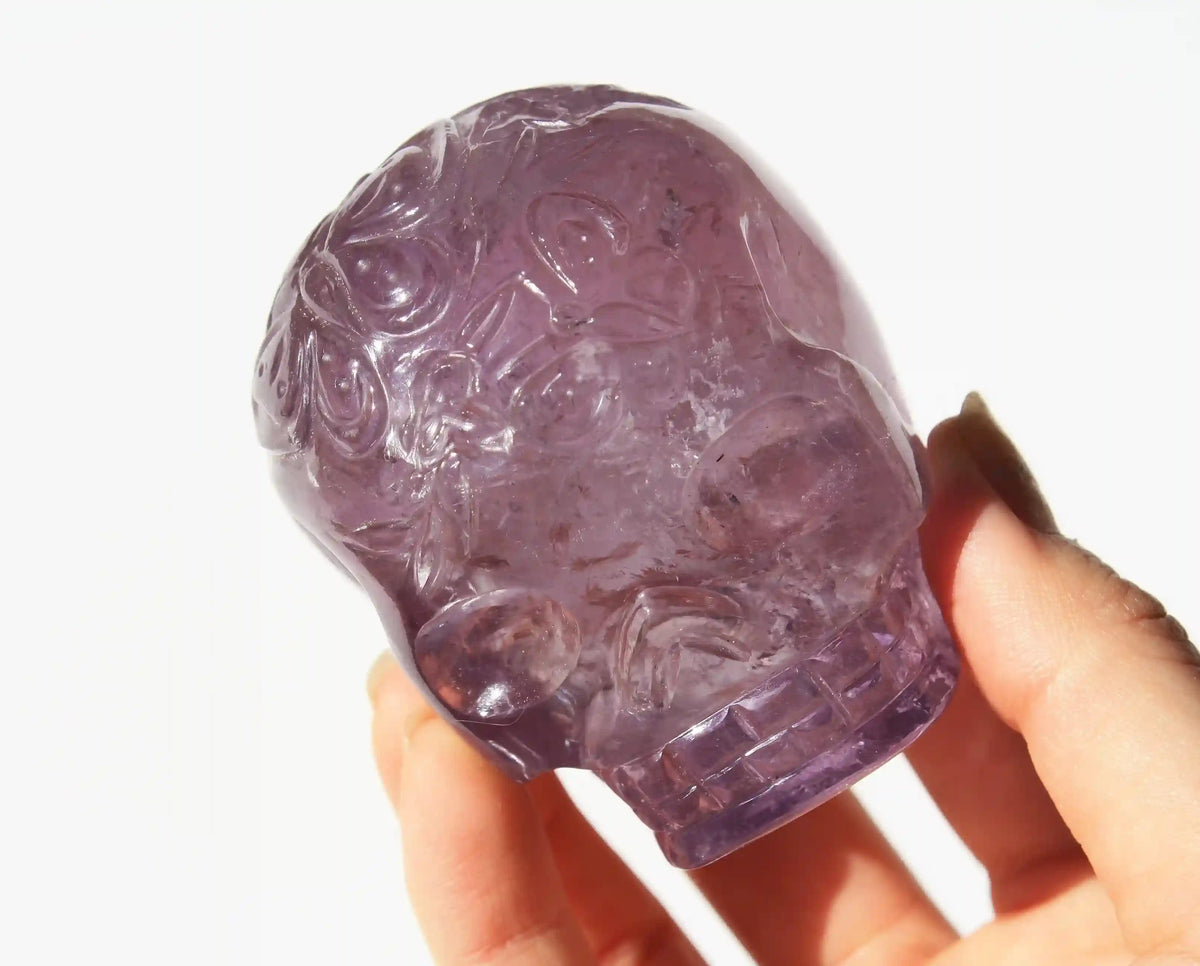 Amethyst Crystal Butterfly Engraved Skull by Vikas Meena
