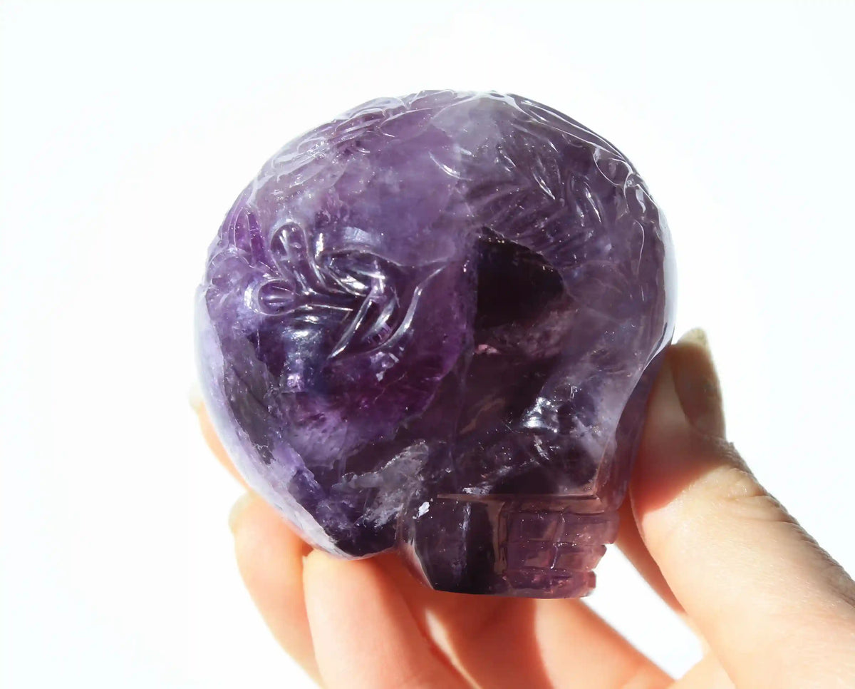 Amethyst Crystal Butterfly Engraved Skull by Vikas Meena