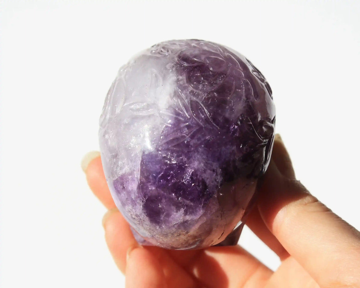 Amethyst Crystal Butterfly Engraved Skull by Vikas Meena